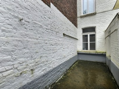 Studio 33 m avec cour-terrasse  vendre - Faibles charges | tude Immo
